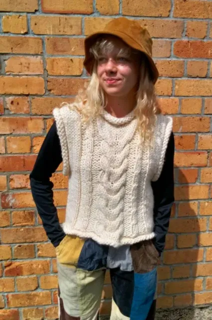 P121 Cosy Cable Vest - Countrywide Yarns Knitting Pattern